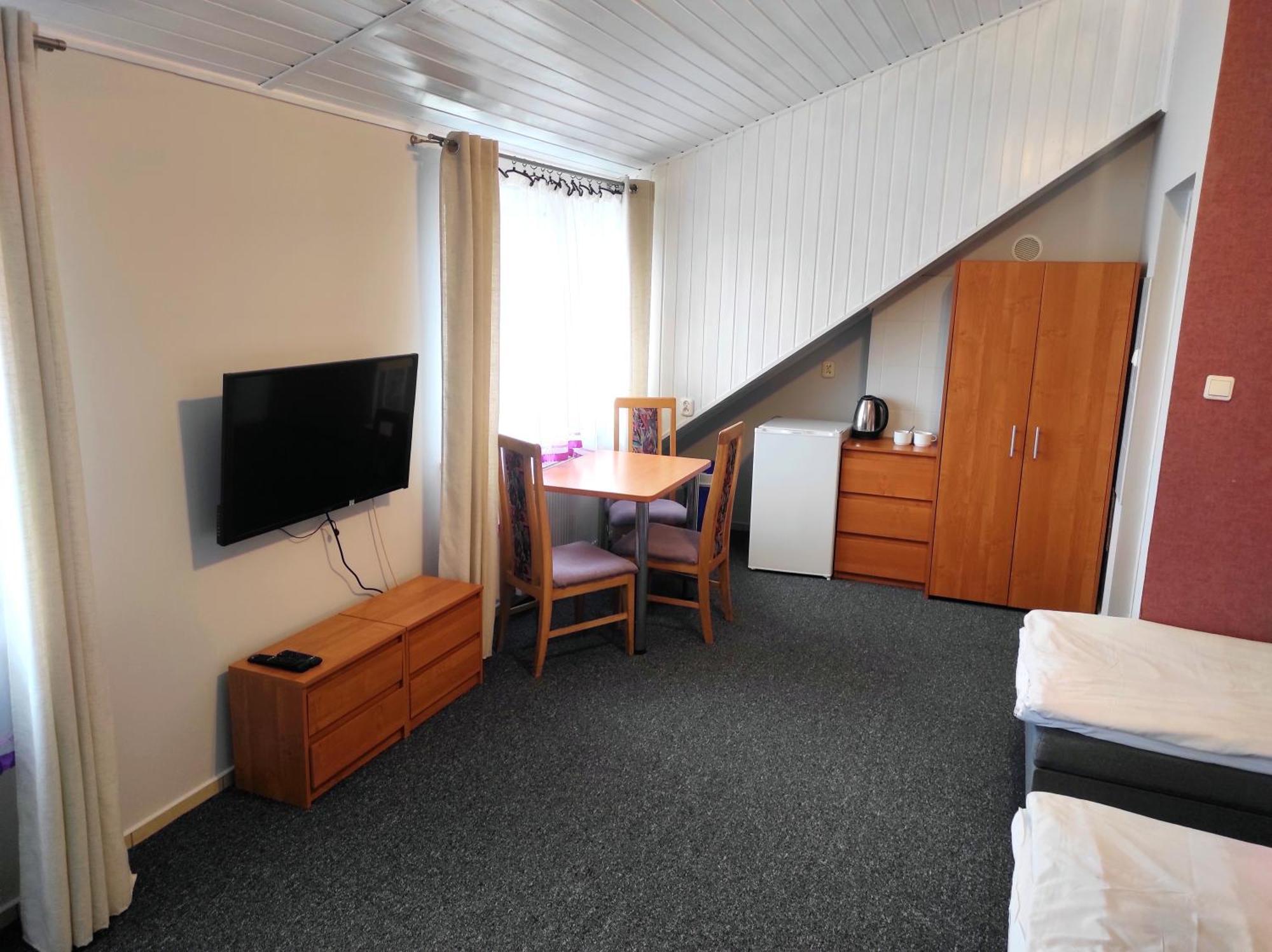 Dreibettzimmer mit eigenem Bad
